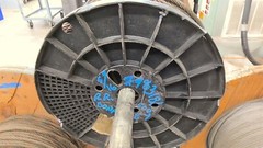 Portable Wire Rack Dispenser With 3 Rolls of wire as pictured