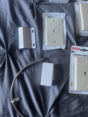 Variety Of Different Electrical And Alarm Installation Parts, Some Used,Some Not