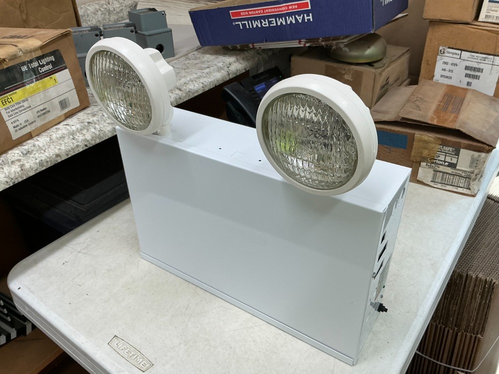 EVENLITE INC. TUFFLITE S4E100 EMERGENCY LIGHT, 120/277/347V – 12V 100W – NEW