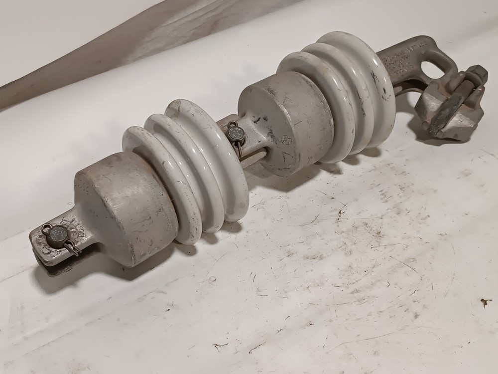 Porcelain high-voltage electrical insulator, 45 Ft/Lb, 6-3/0 ACSR, 6-4/0 AL