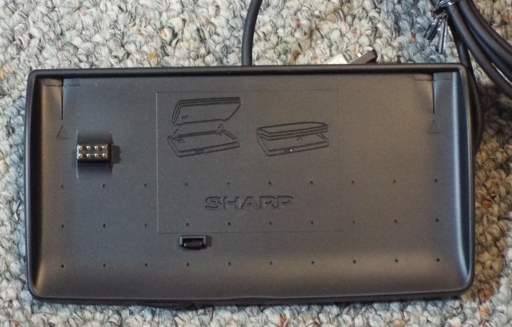 Sharp CE-61T 7A202070 Cradle Dock for Sharp Wizard Organizer – black