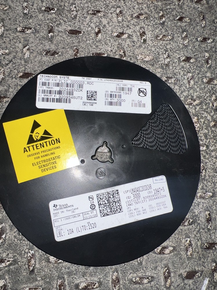 A Spool Of 3,000 Texas Instruments Integrated Circuits LM4040C20IDCKR