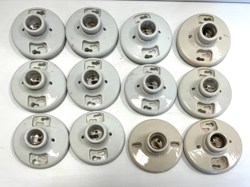 (12) Porcelain Light Fixture bases, 4.5″ diameter, 9 white, 3 beige (USED)