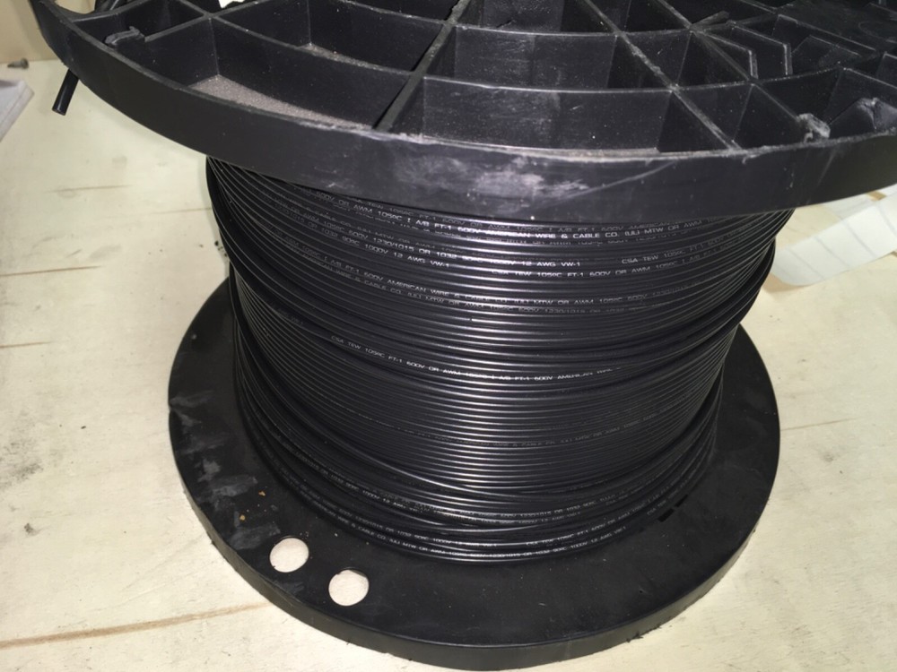 Empire wire, MTW-12G-01, 2000’ of wire on spool left, 60lbs